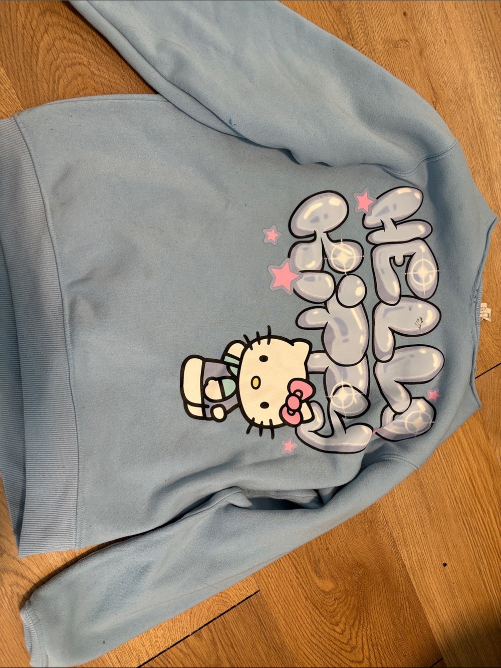 Hello Kitty Light Blue Graphic Sweatshirt with Pink Accents
